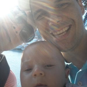 Vlad Jokicic smiling with family